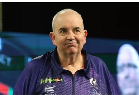 Phil Taylor's net worth after 16 world titles as darts legend .